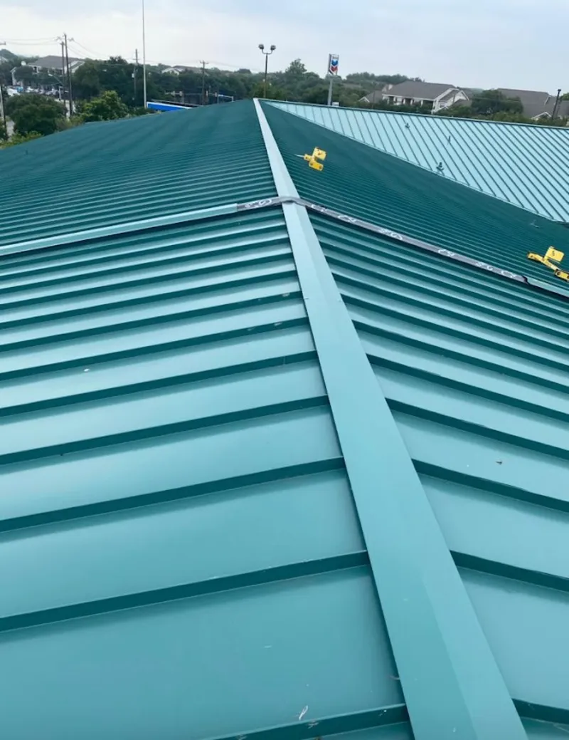 Green commercial metal roof ridge and valley for Metal Roof Repair in West Hempfield